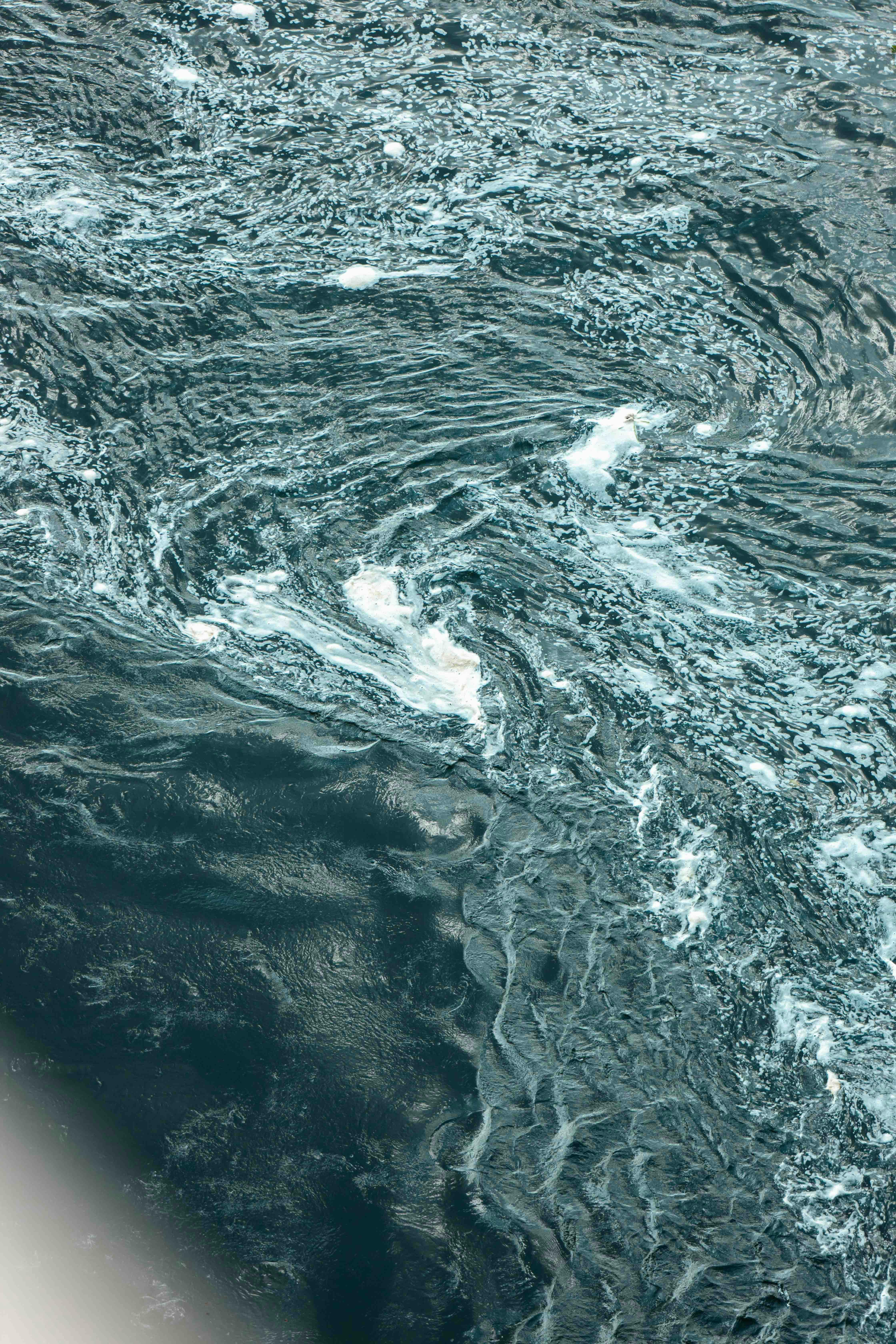 Aerial view of swirling ocean currents