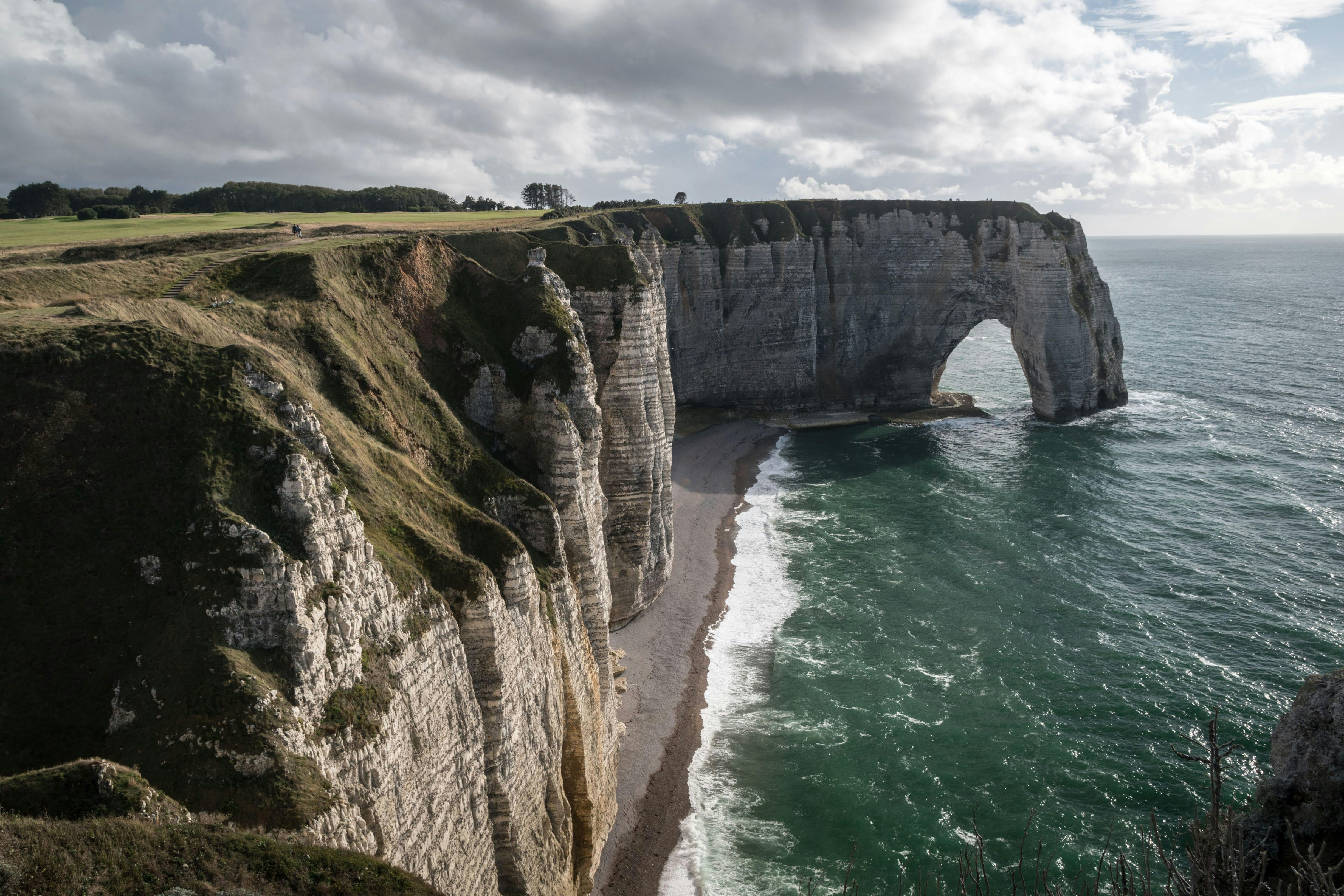 Coastal cliffs and waves showing erosion