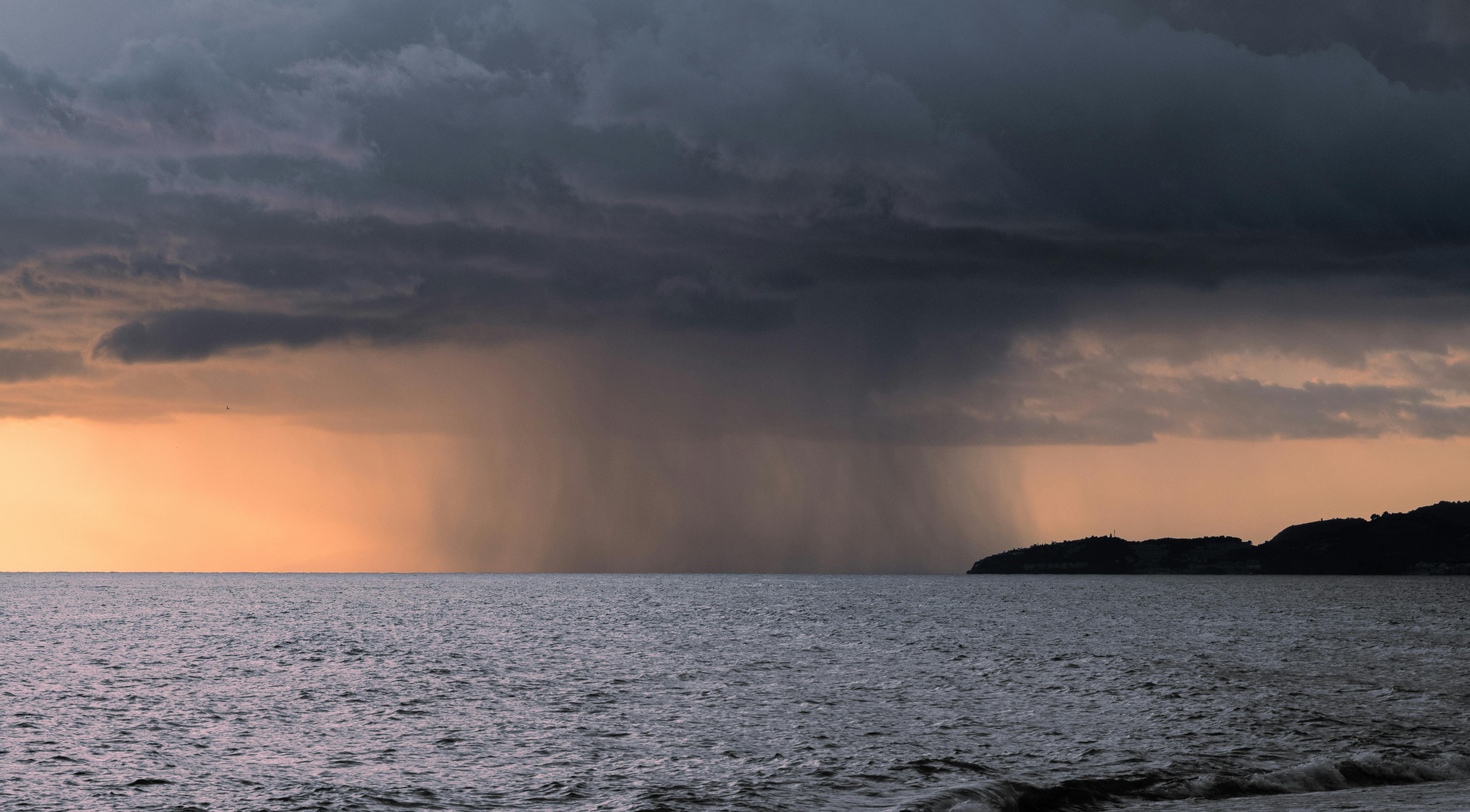 Dramatic Ocean Storm at Sunset